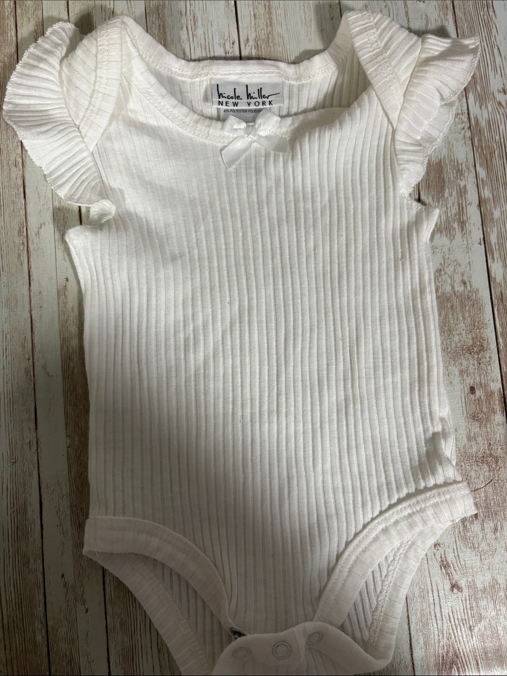 Nicole Miller 0-3mo onesies (qty7)